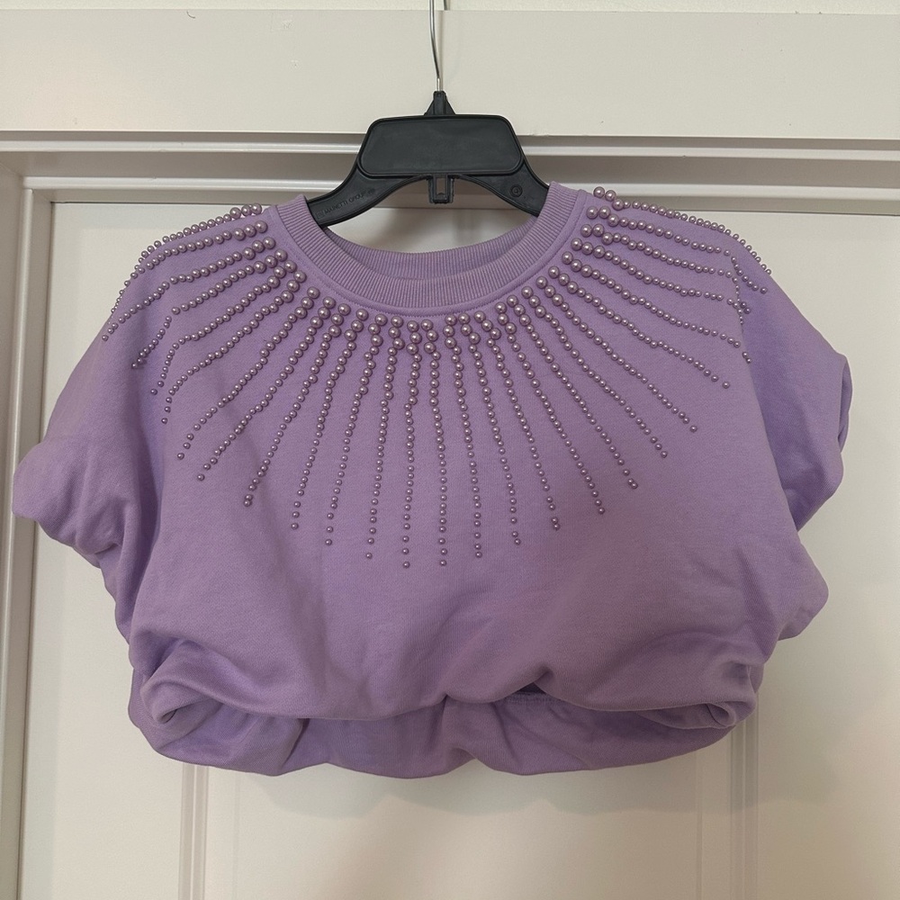 Queen of sparkles. Purple crop sweatshirt with pearl detail. Size XS
